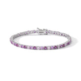 Comete bracciale in argento 925‰ modello tennis con zirconi color rubino e rosa. Lunghezza bracciale 18 cm.