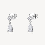 Orecchini pendenti in argento rodiato 925‰ con square e pear cubic zirconia.