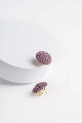 Orecchini a bottone in pietre di Swarovski, con chiusura a clips.