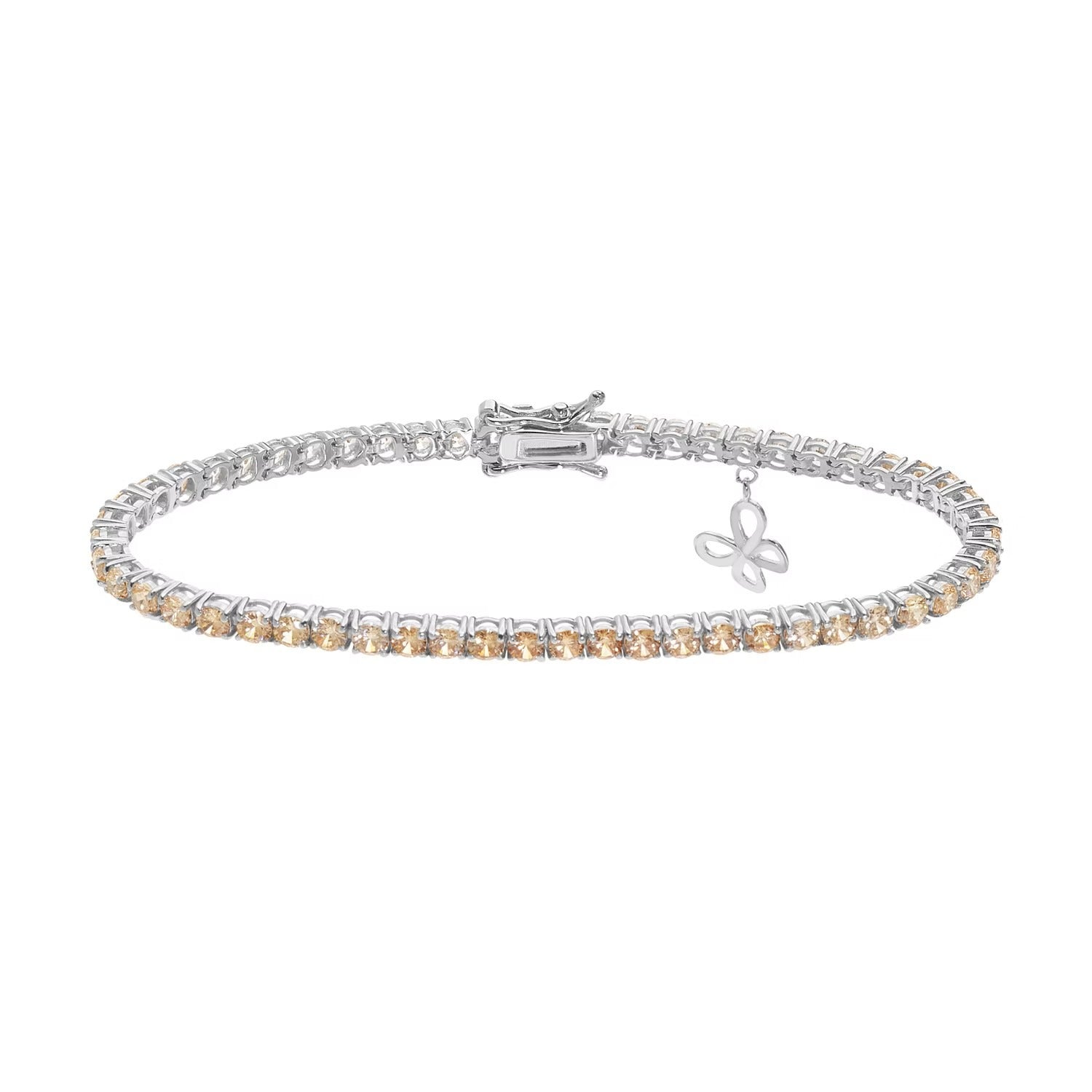 Comete bracciale in argento 925‰ modello tennis con cristalli degradè bianchi e champagne. Con dettaglio farfalla pendente. Lunghezza bracciale 18 cm.