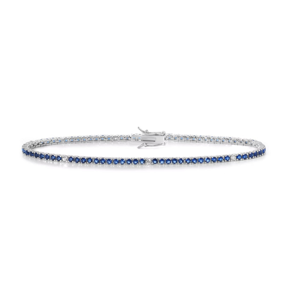 Comete bracciale in argento 925‰ modello tennis con zirconi color zaffiro blu e bianchi. Lunghezza bracciale 18 cm.