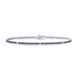 Comete bracciale in argento 925‰ modello tennis con zirconi color zaffiro blu e bianchi. Lunghezza bracciale 18 cm.