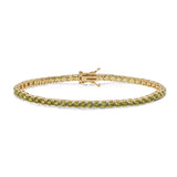 Comete bracciale in argento 925‰ modello tennis con doratura e zirconi color peridot. Lunghezza bracciale 18 cm.