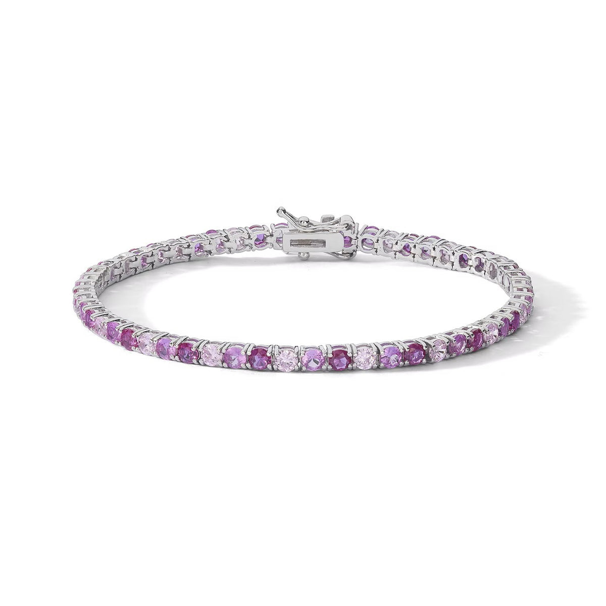 Comete bracciale in argento 925‰ modello tennis con zirconi color rubino e rosa. Lunghezza bracciale 18 cm.