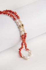 Collana a sciarpa in corallo e perle