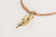 Ciondolo fiore con pavé di Swarovski