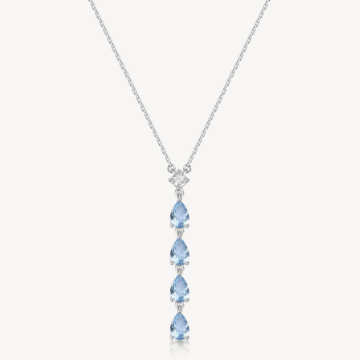 Collana girocollo in argento rodiato 925‰ e pendente con square cubic zirconia e pear cubic zirconia colore light sapphire.
