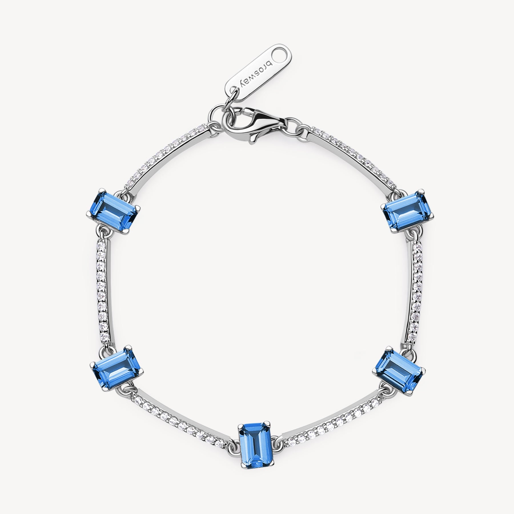 Bracciale semirigido in argento rodiato 925‰ con cubic zirconia chiari e baguette cubic zirconia colore sapphire.