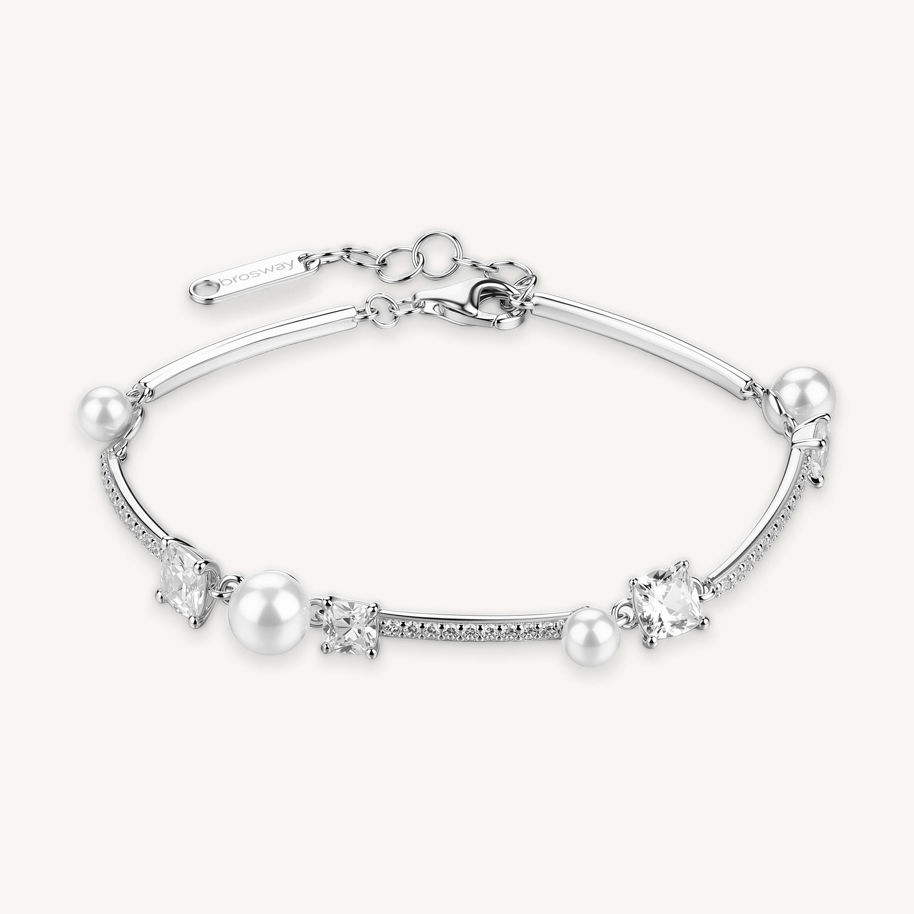 Bracciale semirigido in argento rodiato 925‰ con perle di conchiglia e cubic zirconia.