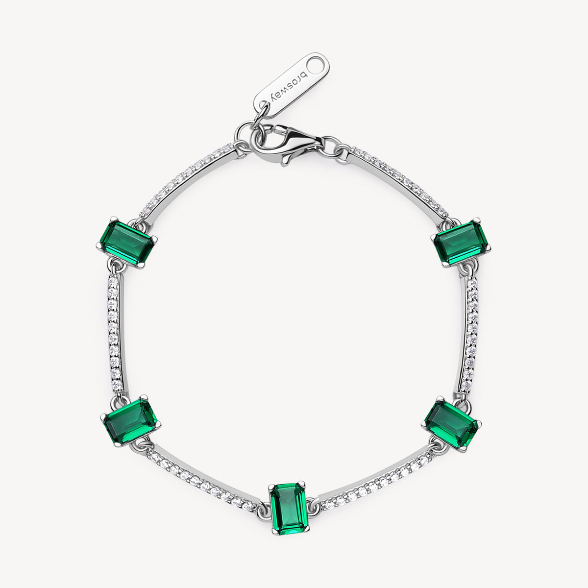 Bracciale semirigido in argento rodiato 925‰ con cubic zirconia chiari e baguette cubic zirconia colore emerald. Lunghezza bracciale 18cm.