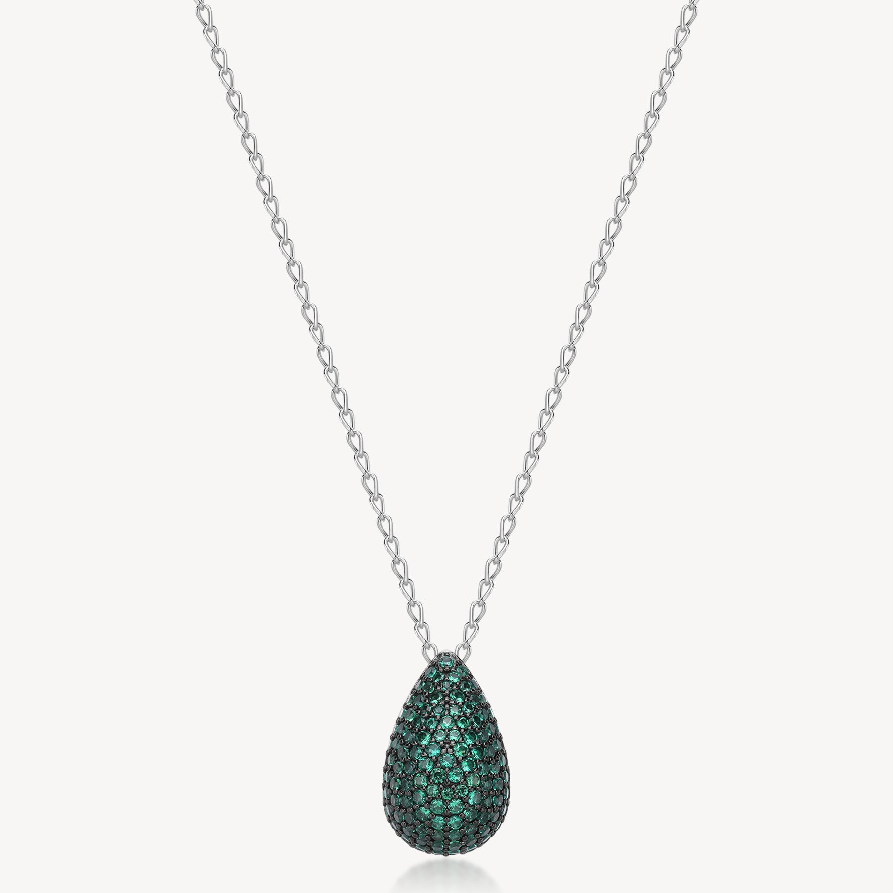 Collana girocollo in argento rodiato 925‰ e pendente con galvanica colore rutenio e cubic zirconia colore emerald. Lunghezza collana 44cm.