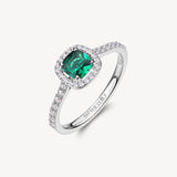 Anello in argento rodiato 925‰ con cubic zirconia chiari e cubic zirconia colore emerald. Misura anello 14.