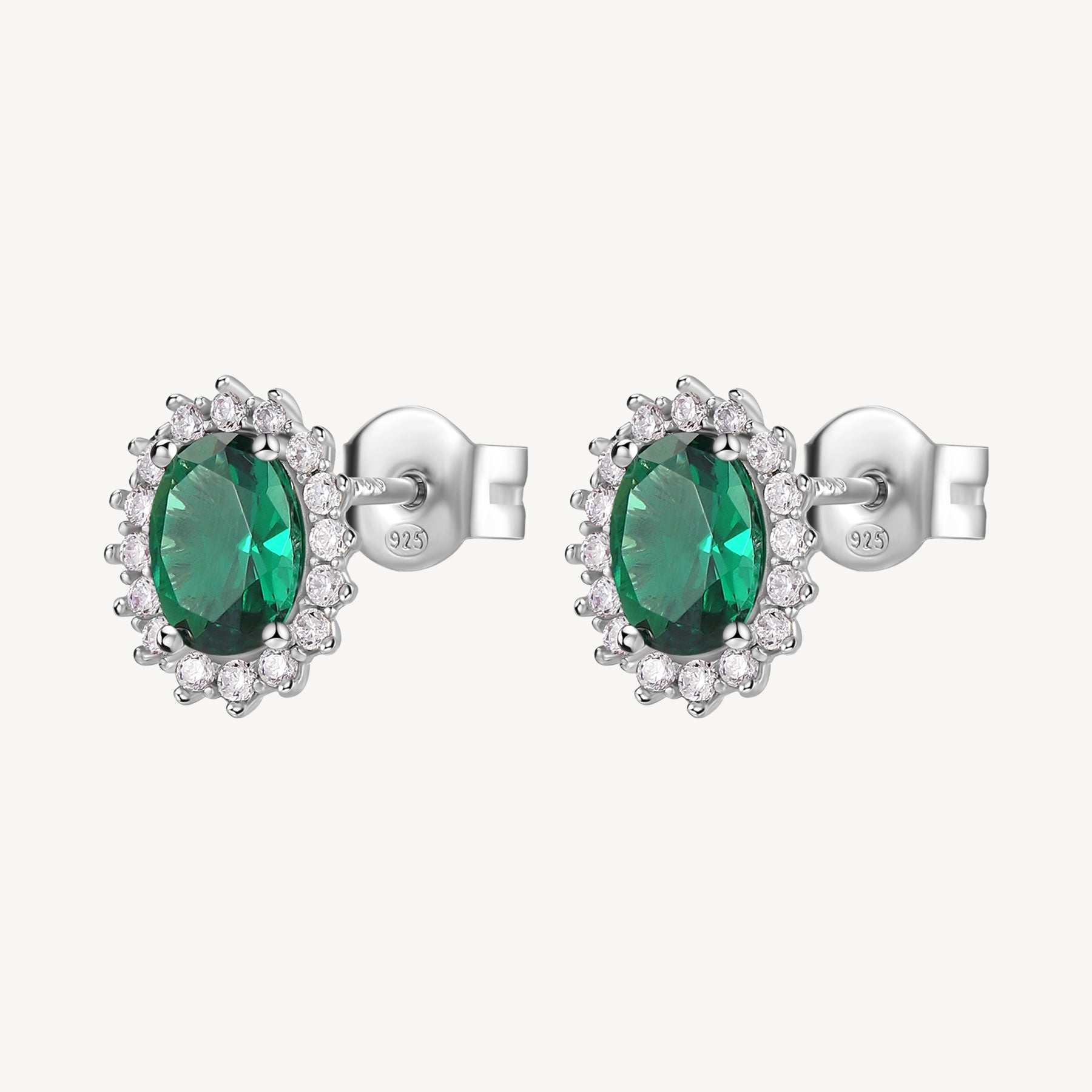Orecchini Kate in argento rodiato 925‰ con cubic zirconia chiari e oval cubic zirconia colore emerald.