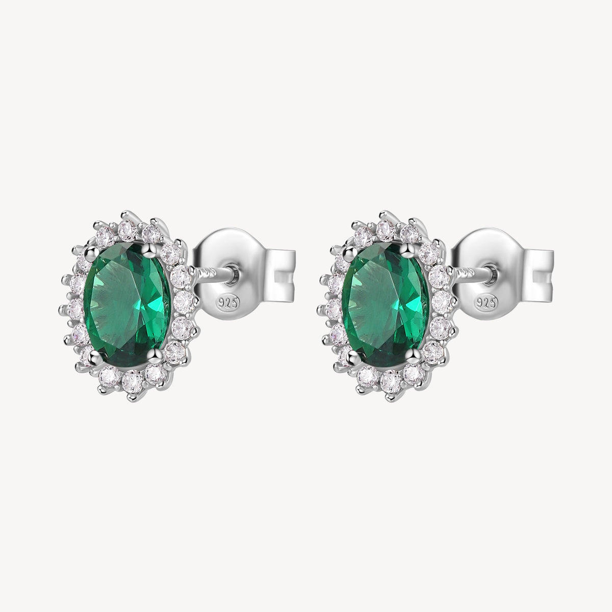 Orecchini Kate in argento rodiato 925‰ con cubic zirconia chiari e oval cubic zirconia colore emerald.