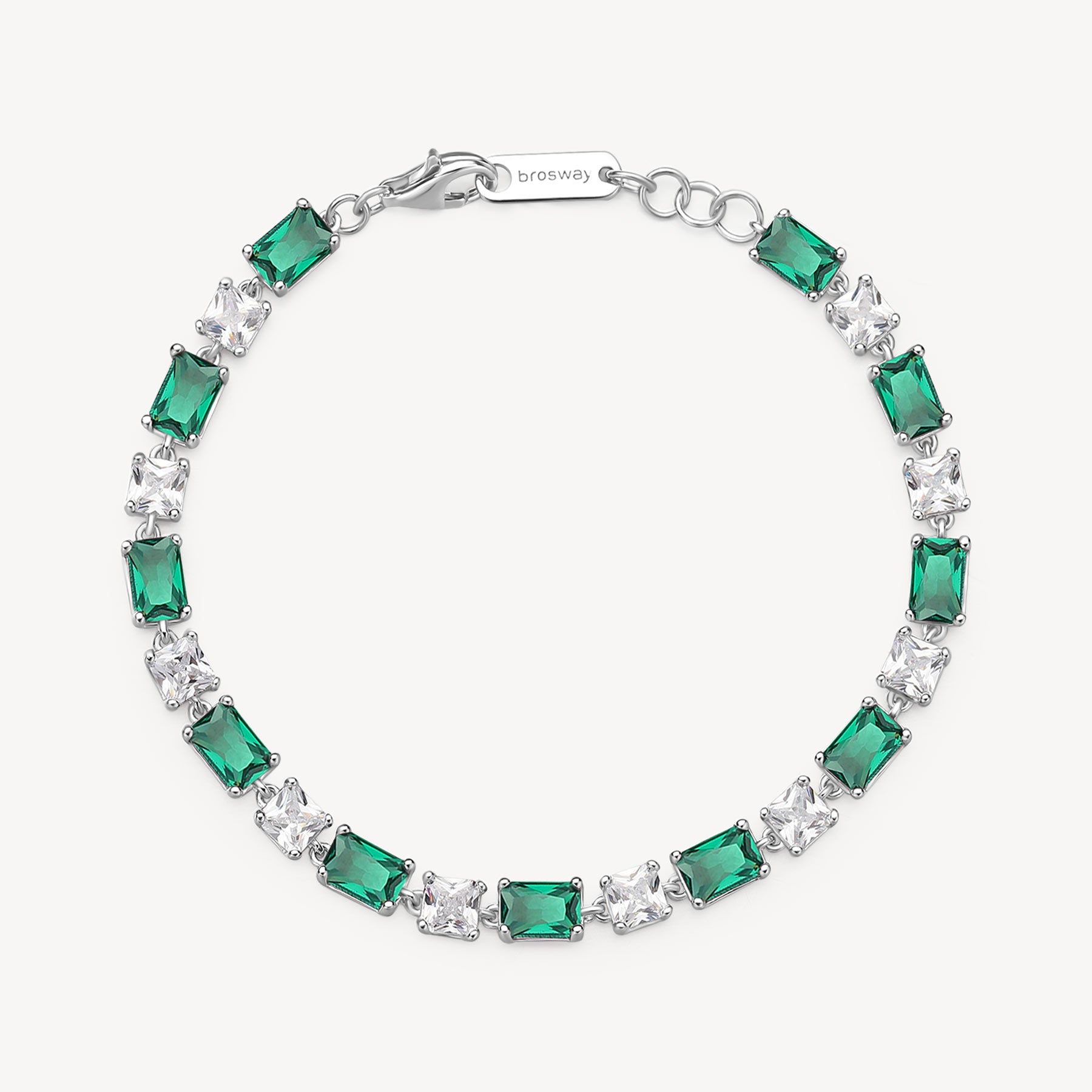 Bracciale in argento rodiato 925‰ con cushion cubic zirconia chiari e baguette cubic zirconia colore emerald. Lunghezza bracciale 18cm.