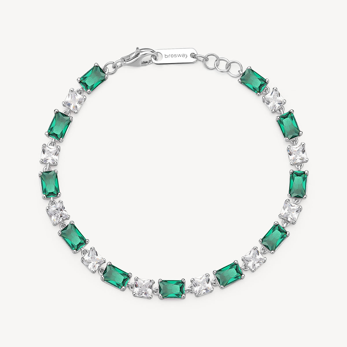 Bracciale in argento rodiato 925‰ con cushion cubic zirconia chiari e baguette cubic zirconia colore emerald. Lunghezza bracciale 18cm.