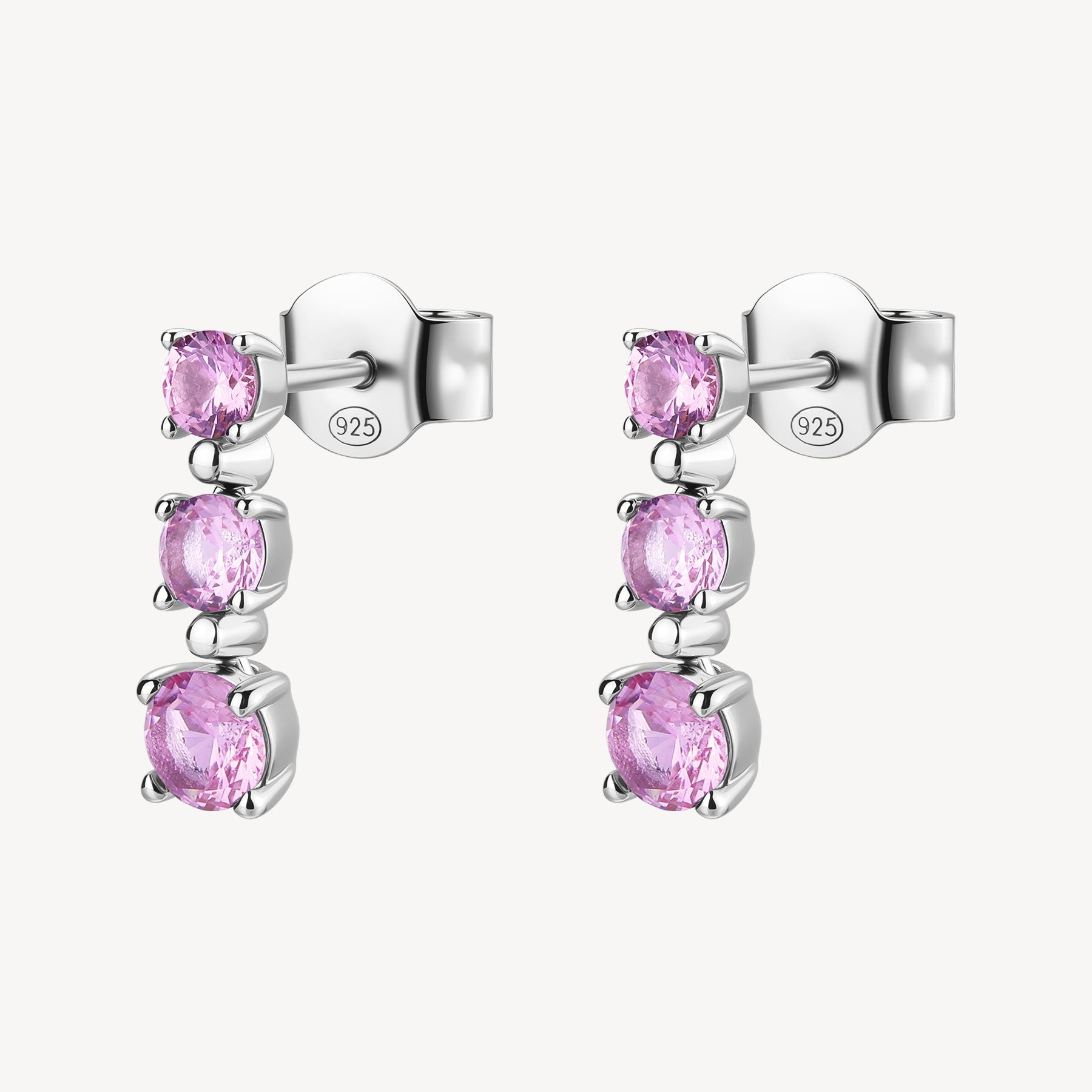 Orecchini pendenti in argento rodiato 925‰ con cubic zirconia colore light ruby.