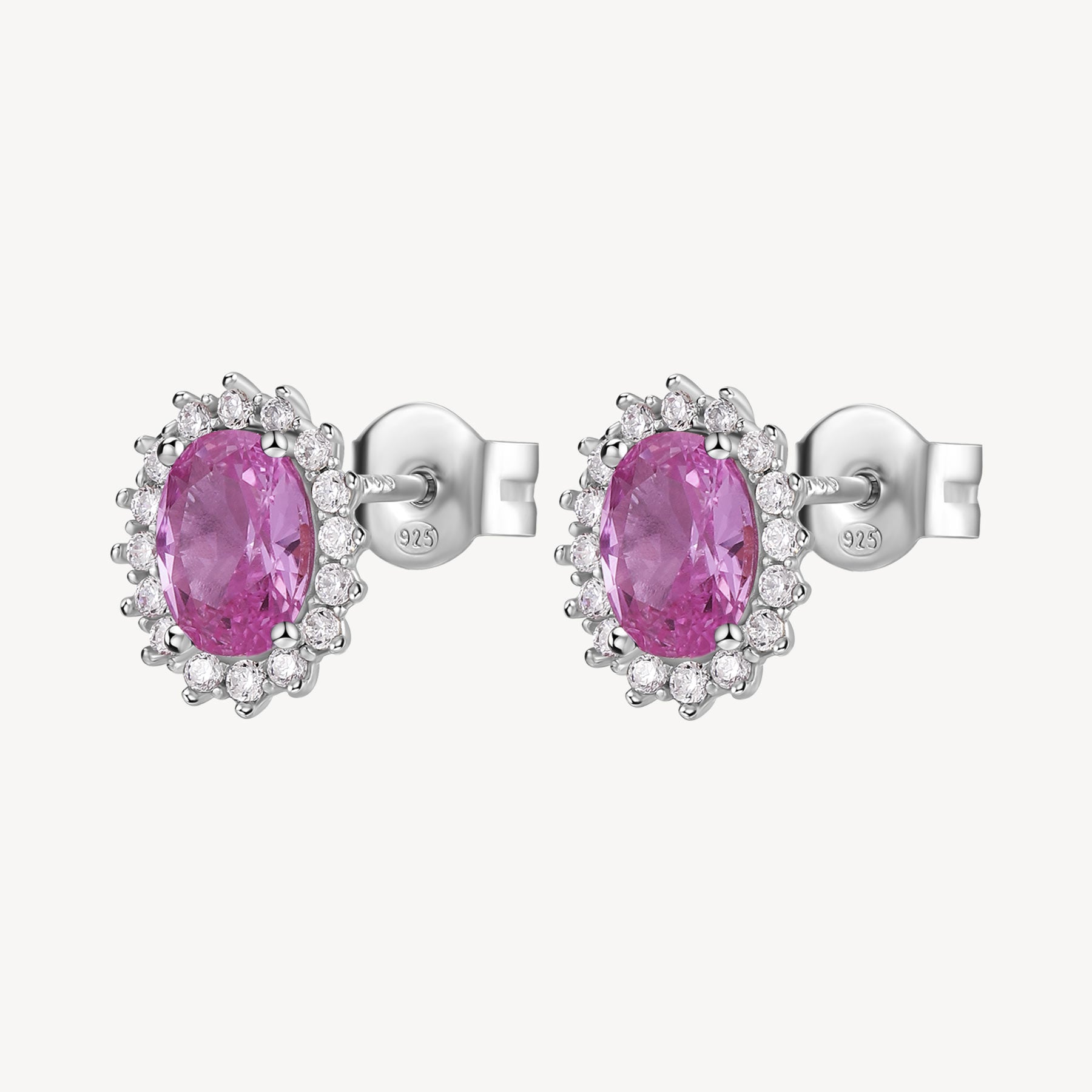Orecchini Kate in argento rodiato 925‰ con cubic zirconia chiari e oval cubic zirconia colore light ruby.